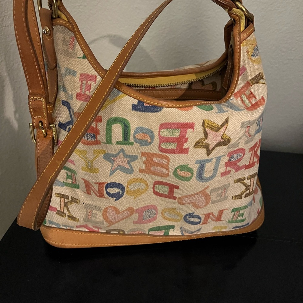 Dooney & Bourke Cream Shoulder Bag with Playful Pattern
